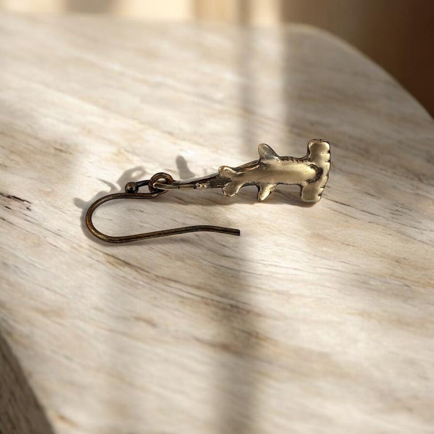 Big Blue by Roland St John bronze hammerhead shark earrings, detailed boho style, perfect for ocean lovers.