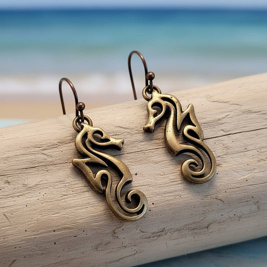 Big Blue by Roland St John bronze seahorse drop earrings with French hooks, detailed and lifelike design.