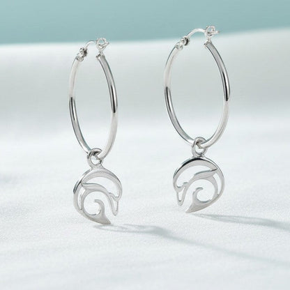 Big Blue by Roland St John sterling silver hoop earrings with playful dolphin charms. Approx. 1.75 inches long.