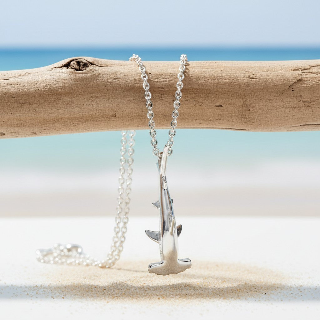Big Blue by Roland St John sterling silver mini hammerhead shark pendant necklace on a silver chain, detailed 3D design.