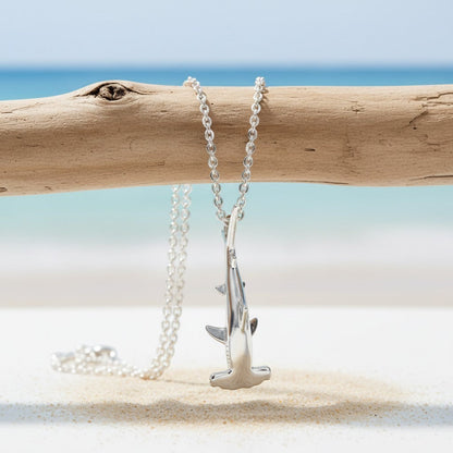 Big Blue by Roland St John sterling silver mini hammerhead shark pendant necklace on a silver chain.