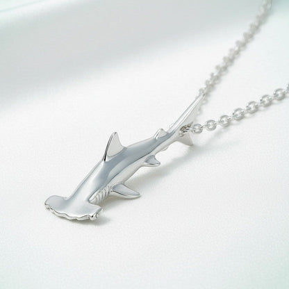 Big Blue by Roland St John sterling silver mini hammerhead shark necklace, detailed 3D pendant on a silver chain.