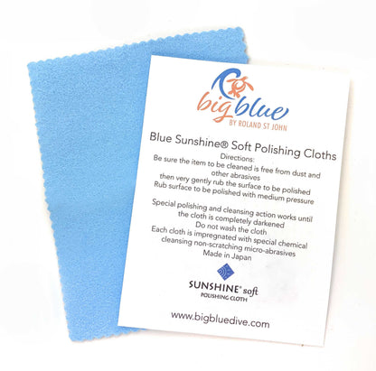 Big Blue by Roland St John blue polishing cloth and care instructions for sterling silver jewelry.