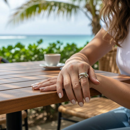 Big Blue by Roland St John sterling silver adjustable shark ring, handcrafted with realistic detail, worn on a woman's finger.
