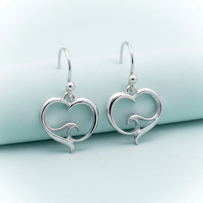 Big Blue by Roland St John sterling silver heart drop earrings with a wave design inside. Hypoallergenic and nickel-free.