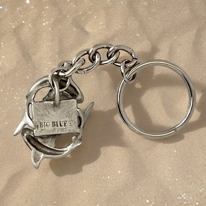 Big Blue by Roland St John pewter keychain with two reef sharks circling a dive flag. Detailed 3D design.
