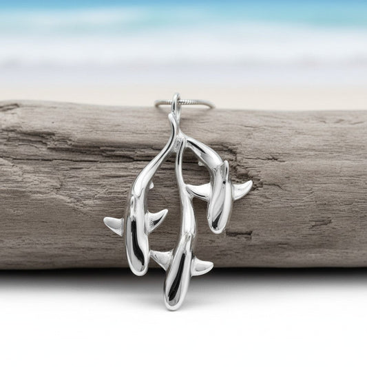 Big Blue by Roland St John sterling silver triple grey reef shark pendant necklace, inspired by underwater motion.