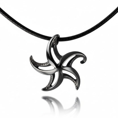 Big Blue by Roland St John starfish pendant necklace in jet black finish on a black cord, modern unisex design.