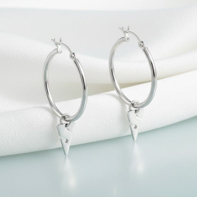 Big Blue by Roland St John sterling silver hoop earrings with sculpted line arrow charms, inspired by cave diving.