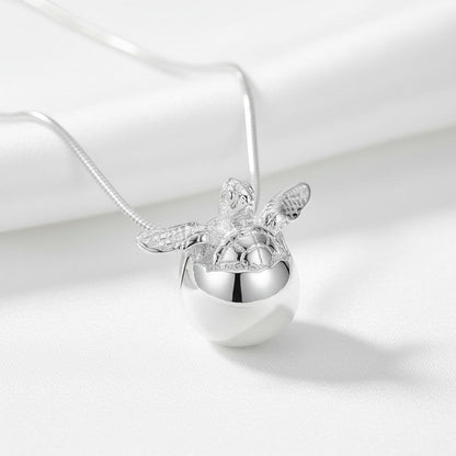 Big Blue by Roland St John sterling silver baby sea turtle hatchling necklace, symbolizing hope and new beginnings.