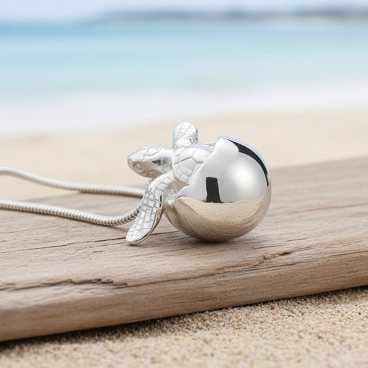 Big Blue by Roland St John sterling silver baby sea turtle hatchling necklace, symbolizing hope and new beginnings.