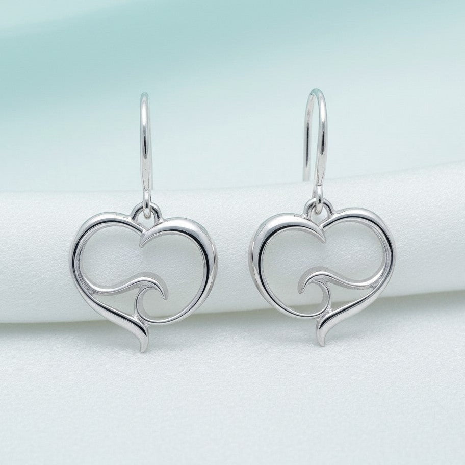 Big Blue by Roland St John sterling silver heart drop earrings with a wave design inside the heart.