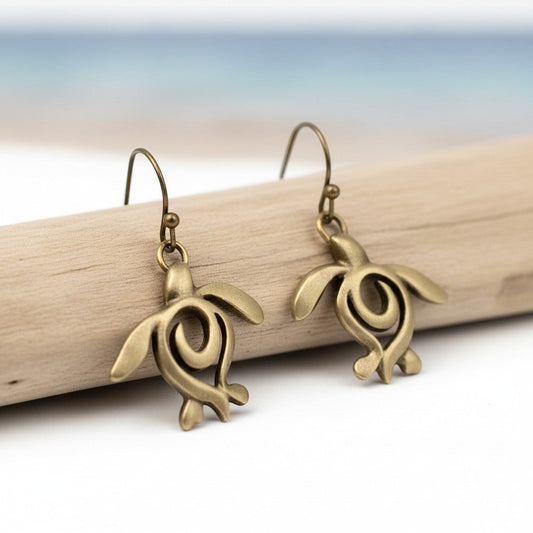 Big Blue by Roland St John bronze turtle drop earrings, part of the Ocean Traveler collection. Features a stylized sea turtle design with French wires.