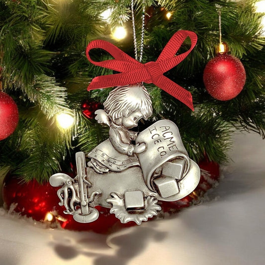Big Blue by Roland St John pewter Christmas ornament of an angel and octopus with ice cubes, hanging on a tree.