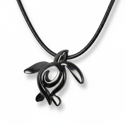 Big Blue by Roland St John jet black pewter turtle pendant necklace with a black cotton cord. Ocean Traveler Honu Collection.