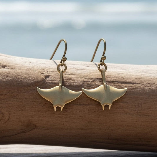 Big Blue by Roland St John bronze manta ray drop earrings, part of the Sealife Collection. Sculpted in bronze with a warm, earthy tone.