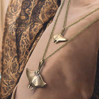 Big Blue by Roland St John layered bronze necklace with two manta ray pendants, boho beach style.