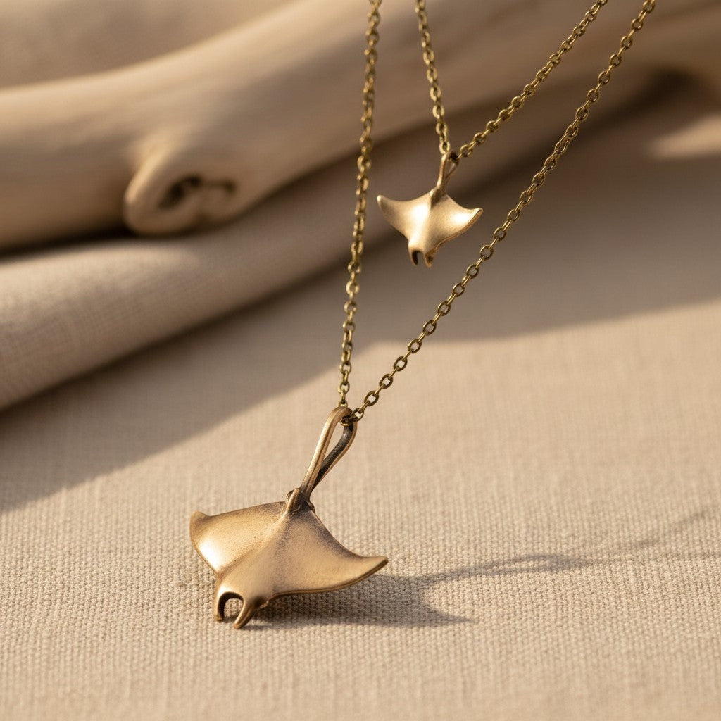 Big Blue by Roland St John layered bronze necklace with two manta ray pendants. Boho beach jewelry.
