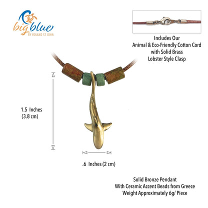 Big Blue by Roland St John medium bronze reef shark pendant necklace with ceramic accent beads on a cord.