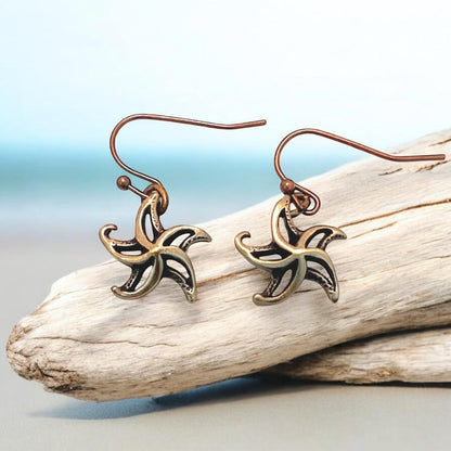 Big Blue by Roland St John bronze starfish drop earrings with a contemporary boho design, perfect for beach lovers.