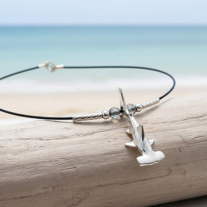 Big Blue by Roland St John sterling silver hammerhead shark choker necklace with beaded accents on cable wire.