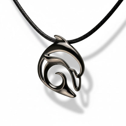 Big Blue by Roland St John jet black dolphin pendant necklace on black cord, sculpted recycled pewter, modern design.