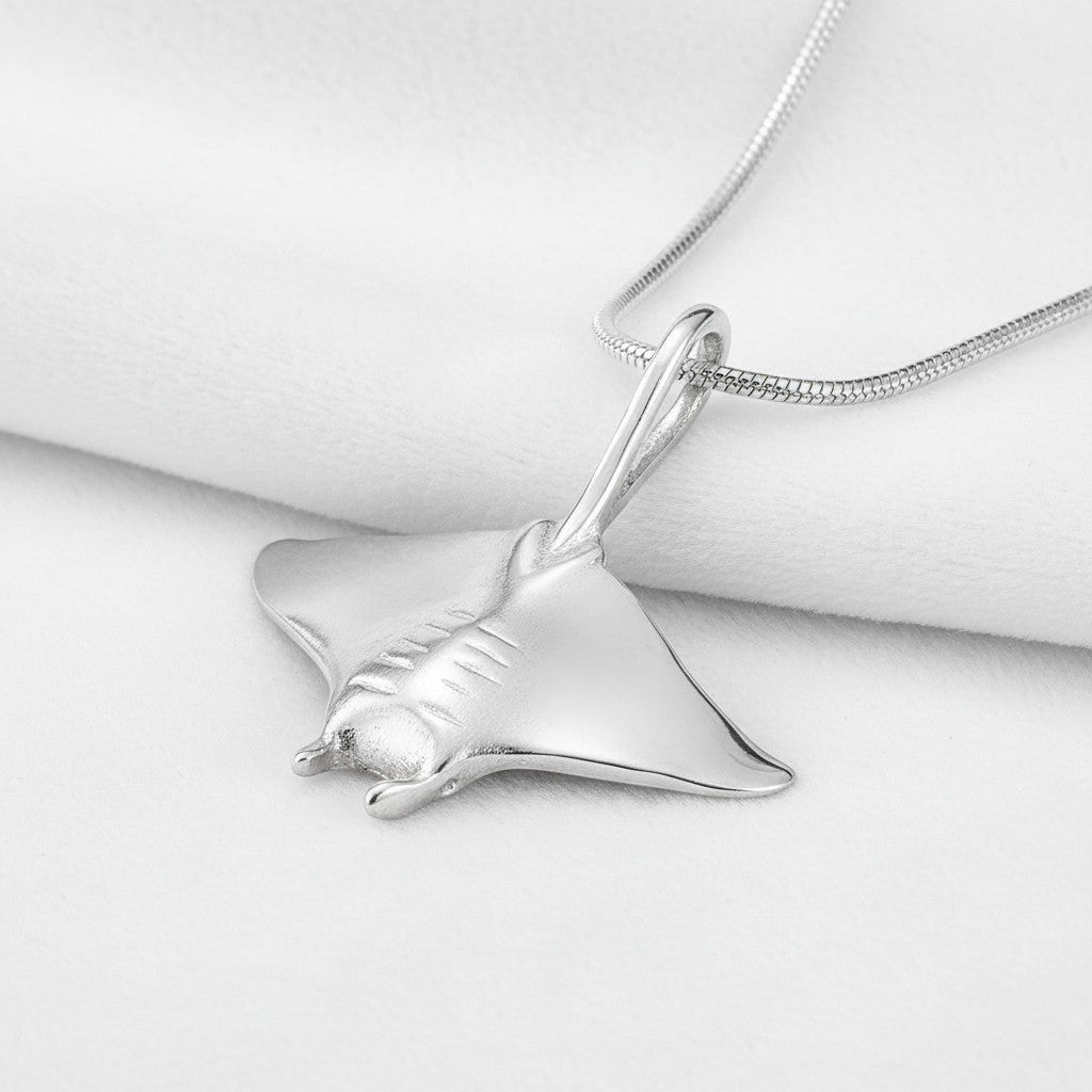 Big Blue by Roland St John realistic sterling silver manta ray pendant necklace with snake chain.