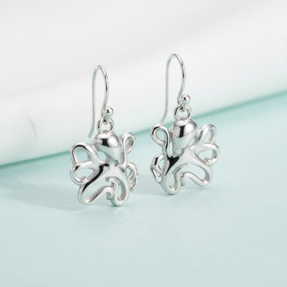 Big Blue by Roland St John sterling silver octopus drop earrings with intricate tentacle details. Ocean-inspired jewelry.