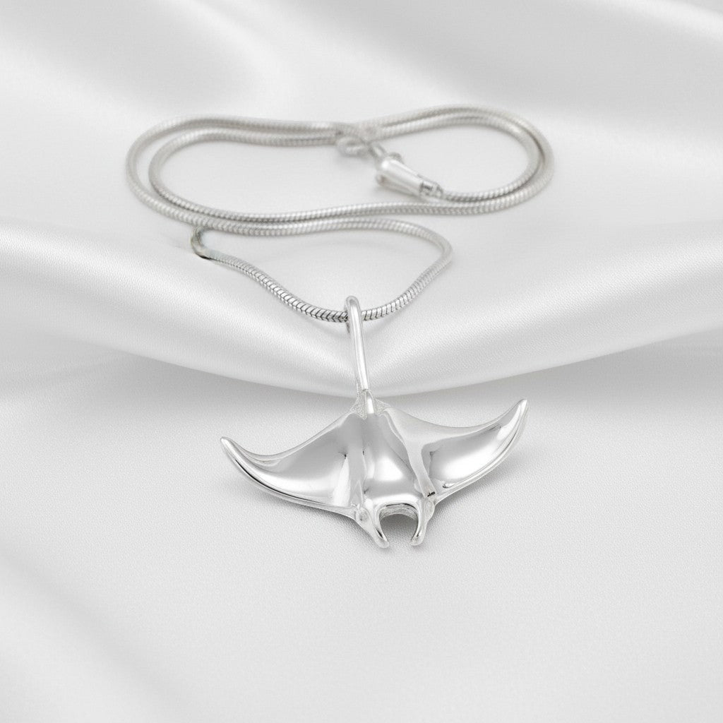 Big Blue by Roland St John realistic sterling silver manta ray pendant necklace with snake chain.