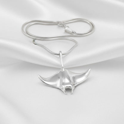 Big Blue by Roland St John realistic sterling silver manta ray pendant necklace with snake chain.