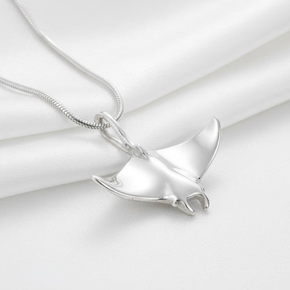 Big Blue by Roland St John realistic sterling silver manta ray necklace with detailed wings and body, on a snake chain.