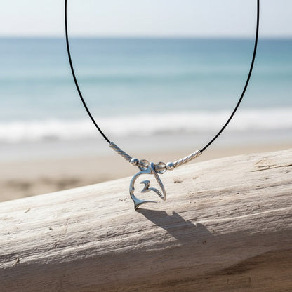 Big Blue by Roland St John sterling silver mini shark choker necklace on black cable wire with clear beads.