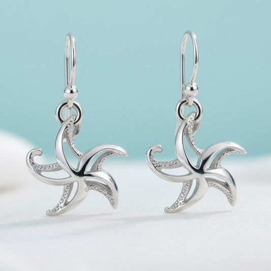 Big Blue by Roland St John "Starry" sterling silver starfish drop earrings with small cubic zirconia accents.