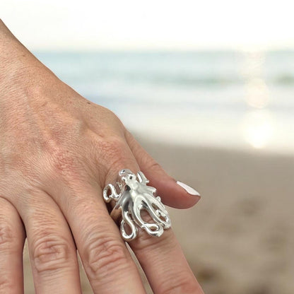 Big Blue by Roland St John sterling silver octopus ring with adjustable fit, detailed tentacles wrapping around a finger.